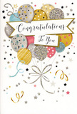 An ornate congratulations card is pictured, designed with the same care and balance that goes into arranging a celebratory bouquet for a Barnes milestone. At its heart is a cheerful spray of balloons gathered like a cluster of flowers, rising from the lower edge and spreading upwards across the card. The balloons are round and glossy in appearance, tinted in harmonious shades of gold, silver, champagne, powder blue, blush pink, and soft grey. Some have glittery surfaces, others are scattered with tiny metallic stars or fine linear patterns, suggesting both sparkle and gentle texture. From the base of each balloon, slender ribbons of gold and silver twist and loop downward, eventually merging into one graceful tail, as if anchored off the bottom edge of the card. Floating across the centre is a simple yet elegant banner, slightly curved, bearing the words "Congratulations To You" in flowing, decorative calligraphy that adds a note of sincerity and warmth. Around this central motif, small stars, dots of confetti, and curling streamers drift across a pale, softly illuminated background, mimicking the carefree movement of party decorations caught in a light breeze over Barnes Green. The composition feels airy and optimistic, radiating genuine joy without being loud or brash. You can imagine this card being chosen to accompany fresh flowers delivered locally for a promotion, exam success, or a special personal achievement, offering a visual whisper of celebration that matches the proud, happy moment it is meant to honour.
